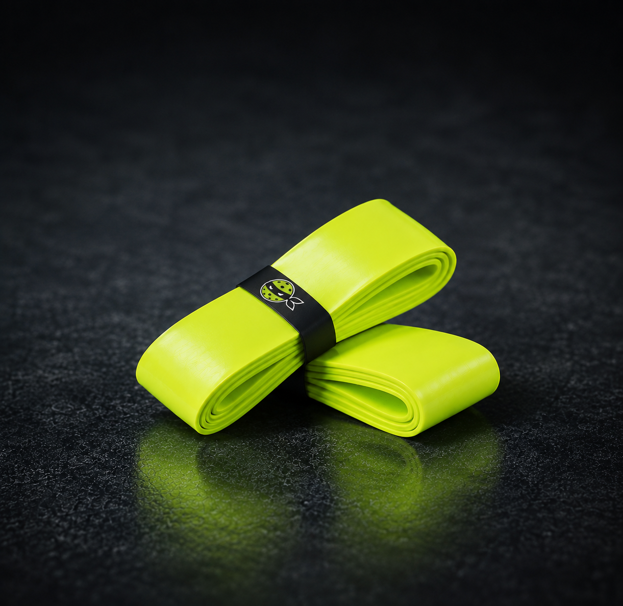 Net Bandits pickleball overgrips in neon green with finishing tape
